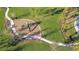 Aerial view of community playground with winding paths and ample green space at 30226 Merilee Pl, Wesley Chapel, FL 33545