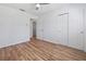 A bedroom with a double door closet and a neutral paint color at 311 W Fern St, Tampa, FL 33604