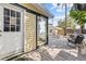 Back deck with outdoor seating, views of the backyard, and mature landscaping at 322 11Th N Ave, St Petersburg, FL 33701