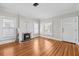 Bright living room with hardwood floors, fireplace, and natural lighting at 322 11Th N Ave, St Petersburg, FL 33701