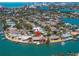 Coastal aerial view of a stunning waterfront property, offering luxurious living by the water at 351 S Julia Cir, St Pete Beach, FL 33706