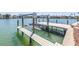 Dock and Boat lift on a scenic canal, perfect for boaters at 351 S Julia Cir, St Pete Beach, FL 33706