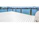 Large wooden dock on the water, perfect for boating and enjoying the views at 351 S Julia Cir, St Pete Beach, FL 33706