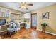 Bright home office with built-in desk, and natural light at 351 S Julia Cir, St Pete Beach, FL 33706