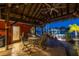 Charming covered patio area featuring waterfront views, ideal for enjoying outdoor dining and entertainment at 351 S Julia Cir, St Pete Beach, FL 33706