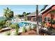 Backyard pool with in-water seating, a spa, and views of the bay in this rendering at 351 S Julia Cir, St Pete Beach, FL 33706