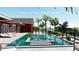 Backyard pool and patio with lounge chairs and a bay view are featured in this rendering at 351 S Julia Cir, St Pete Beach, FL 33706