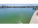 Scenic view of the waterfront, showcasing the tranquil bay and neighborhood homes at 351 S Julia Cir, St Pete Beach, FL 33706