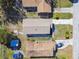 An aerial view showing the entire roof of the house along with surrounding properties at 3540 Emerson S Ave, St Petersburg, FL 33711
