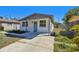 Attractive single-Gathering home with a recently updated front yard, crisp exterior, and a private driveway at 3540 Emerson S Ave, St Petersburg, FL 33711