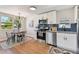Charming kitchen features stainless appliances, granite countertops, and a dining nook at 3540 Emerson S Ave, St Petersburg, FL 33711