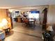 Open dining area with wood table and chairs, connecting seamlessly to the kitchen and living spaces at 36624 Kay Ave, Zephyrhills, FL 33542