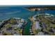 Aerial of waterfront community with condo buildings, private boat docks, and direct access to beautiful open waters at 5196 Beach Se Dr # B, St Petersburg, FL 33705