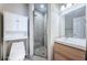 Bathroom boasting a tiled shower, vanity, and toilet at 5196 Beach Se Dr # B, St Petersburg, FL 33705