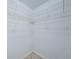 Walk-in closet features shelving and tile flooring at 5196 Beach Se Dr # B, St Petersburg, FL 33705