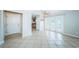Bright and airy living room with tile flooring, double doors to the outside and an open layout at 5196 Beach Se Dr # B, St Petersburg, FL 33705