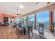 Elegant covered patio with stunning ocean views, comfortable seating, and tile flooring at 5196 Beach Se Dr # B, St Petersburg, FL 33705