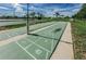 Community shuffleboard courts with seating and landscaped surroundings at 5196 Beach Se Dr # B, St Petersburg, FL 33705
