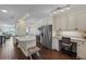 Modern kitchen with stainless steel appliances, stylish countertops, and ample cabinet space at 6001 Bahia Del Mar Cir # 429, St Petersburg, FL 33715