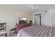 Relaxing bedroom with TV, closet, and neutral color palette at 6001 Bahia Del Mar Cir # 429, St Petersburg, FL 33715