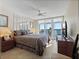 Serene main bedroom with waterfront views, natural light, and calming color scheme at 6001 Bahia Del Mar Cir # 429, St Petersburg, FL 33715