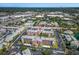 Expansive aerial view of community featuring mature landscaping, a parking area and surrounding city ammenities at 6800 20Th N Ave # 309, St Petersburg, FL 33710