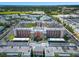 Stunning aerial view of the complex surrounded by lush landscaping, parking, and nearby community features at 6800 20Th N Ave # 309, St Petersburg, FL 33710
