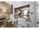Breakfast bar featuring granite countertops and seating overlooking the kitchen at 6800 20Th N Ave # 309, St Petersburg, FL 33710