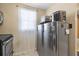 Bright kitchen area featuring stainless steel appliances and a sunlit window at 6800 20Th N Ave # 309, St Petersburg, FL 33710