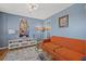 Modern living room with stylish orange sofa and contemporary decor at 6800 20Th N Ave # 309, St Petersburg, FL 33710