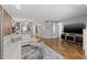 Open-concept living room showcasing the seamless flow to the kitchen and dining area at 6800 20Th N Ave # 309, St Petersburg, FL 33710