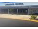 Exterior of Peacock Center, showcasing its façade, signage, and parking area at 8455 112Th St # 202, Seminole, FL 33772