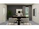 Contemporary home office with two chairs, black desk, and modern decor at 9296 Gladsome Dr, Land O Lakes, FL 34637