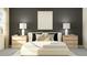 Stylish main bedroom with dark accent wall, neutral furniture, and natural light at 9296 Gladsome Dr, Land O Lakes, FL 34637