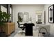 Bright office space featuring two-tone walls, modern desk, mirrors, and elegant decor at 9296 Gladsome Dr, Land O Lakes, FL 34637