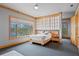 Serene bedroom with a view of the water, a ceiling fan, and neutral decor at 950 Monterey Ne Pt, St Petersburg, FL 33704