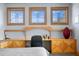 Stylish bedroom features a custom desk, built-in storage, and accent decor at 950 Monterey Ne Pt, St Petersburg, FL 33704