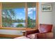 Enjoy the beauty of a peaceful waterfront view from this bright bedroom at 950 Monterey Ne Pt, St Petersburg, FL 33704
