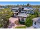 Stunning waterfront home with meticulous landscaping, a brick driveway, and picturesque skyline views at 950 Monterey Ne Pt, St Petersburg, FL 33704