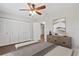 Bedroom featuring a spacious closet, stylish decor, and comfortable furnishings at 9845 84Th Way, Seminole, FL 33777