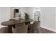 Cozy dining room featuring a contemporary table set and adjacent kitchen, perfect for meals at 9845 84Th Way, Seminole, FL 33777
