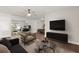 Bright living room with modern furniture and a ceiling fan creating a comfortable atmosphere at 9845 84Th Way, Seminole, FL 33777