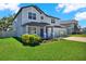 Charming two-story home with a three car garage, manicured lawn and a welcoming front porch at 11486 June Briar Loop, San Antonio, FL 33576