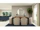 Dining room with a wooden table, cushioned chairs, stylish rug, and round mirror at 11856 Blue Diamond Trl, Parrish, FL 34219