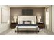 Well-decorated primary bedroom with a stylish bed, matching nightstands, and a comfortable bench at 11856 Blue Diamond Trl, Parrish, FL 34219