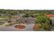 Aerial view of home featuring solar panels, lush landscaping, circular driveway, and a private backyard pool at 13414 Alpine Ave, Seminole, FL 33776