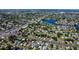 Aerial view of the neighborhood showcasing the home's location amidst lush greenery and convenient access to local amenities at 210 83Rd N Ave, St Petersburg, FL 33702