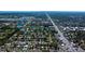 High aerial shot of neighborhood featuring the home close to waterway and other city amenities at 210 83Rd N Ave, St Petersburg, FL 33702