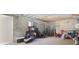 Large unfinished basement, ideal for storage or future finishing, featuring concrete walls and floors at 210 83Rd N Ave, St Petersburg, FL 33702