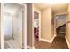Hallway displaying wood-look flooring and access to a bathroom and a bedroom at 210 83Rd N Ave, St Petersburg, FL 33702